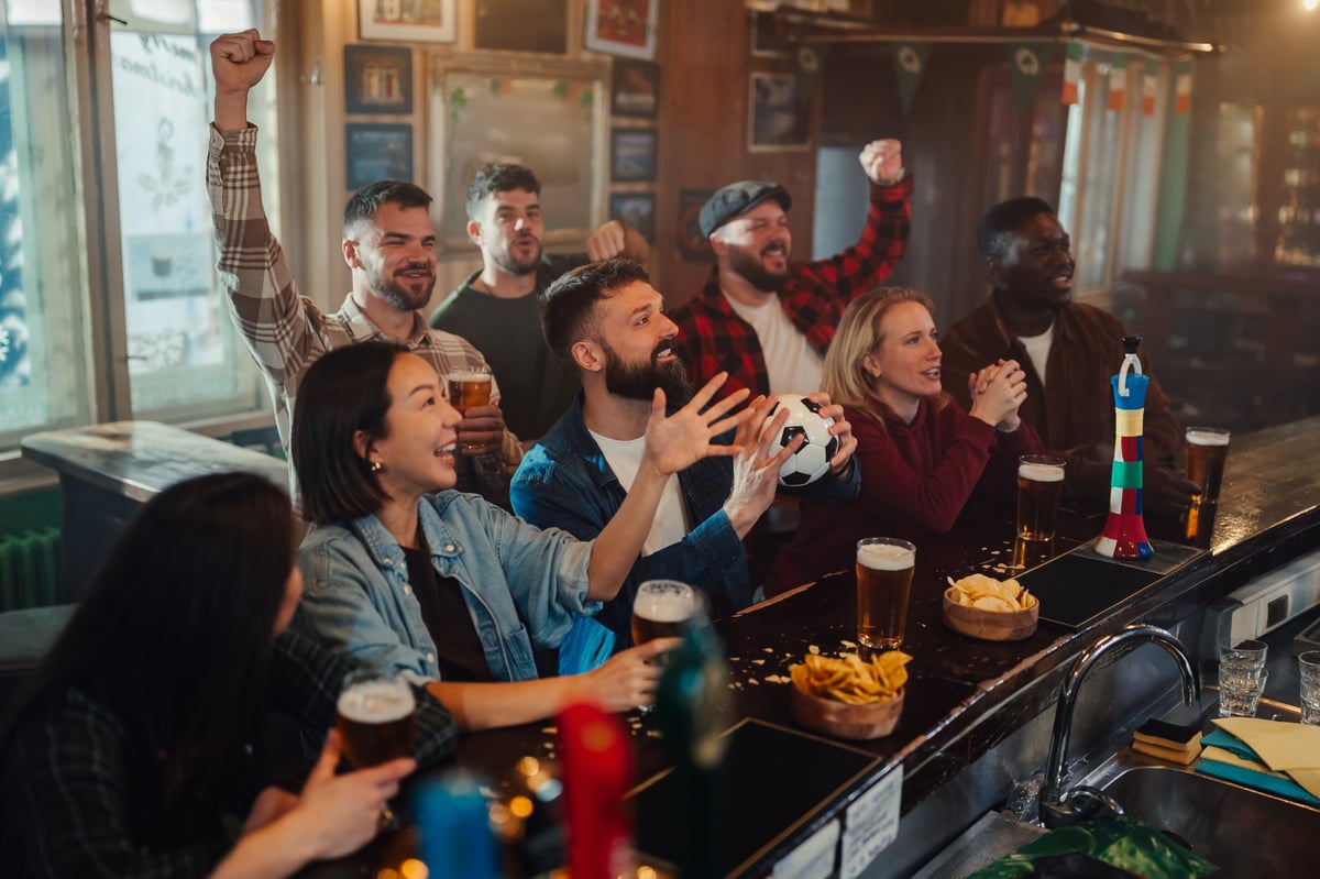 Fans celebrating a goal at Taboo